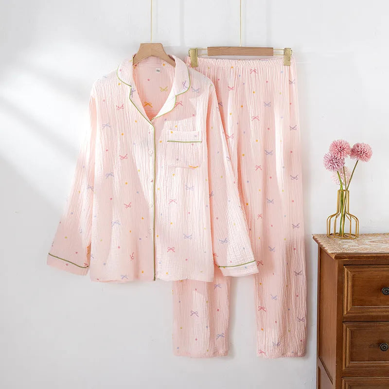 Women's pink cotton crepe pajama suit with long sleeves and matching trousers