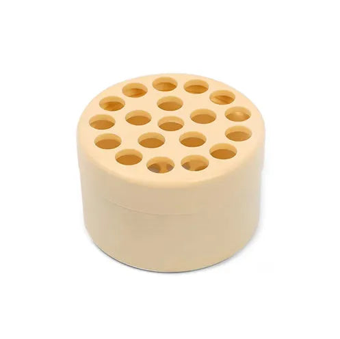 Three spiral stem brackets in green, light gray, and yellow placed on a table