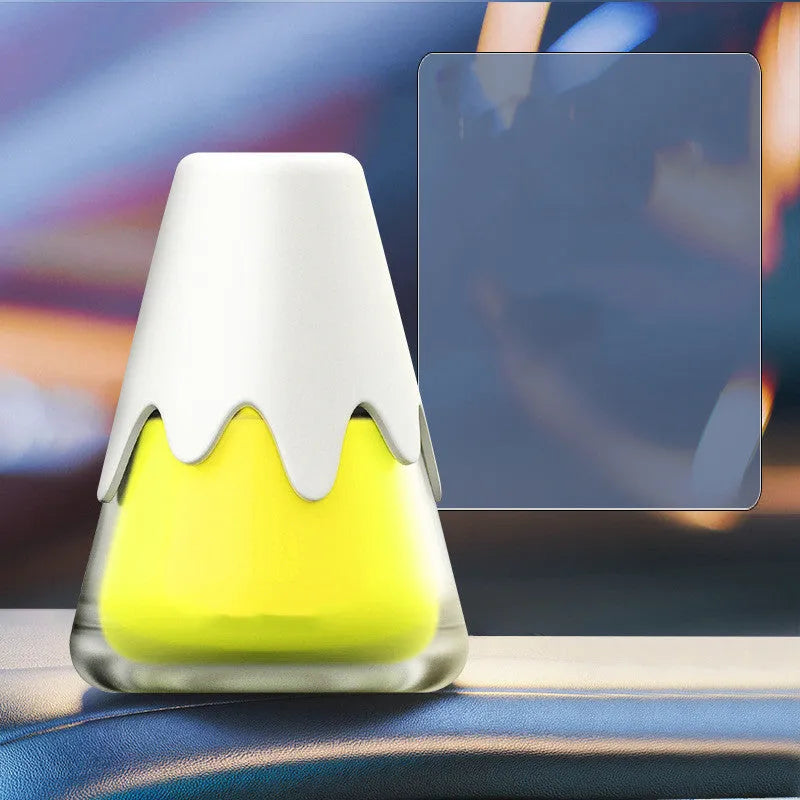 Refillable glass car aromatherapy unit in one of four colour options, showing compact size for dashboard or vent mounting.