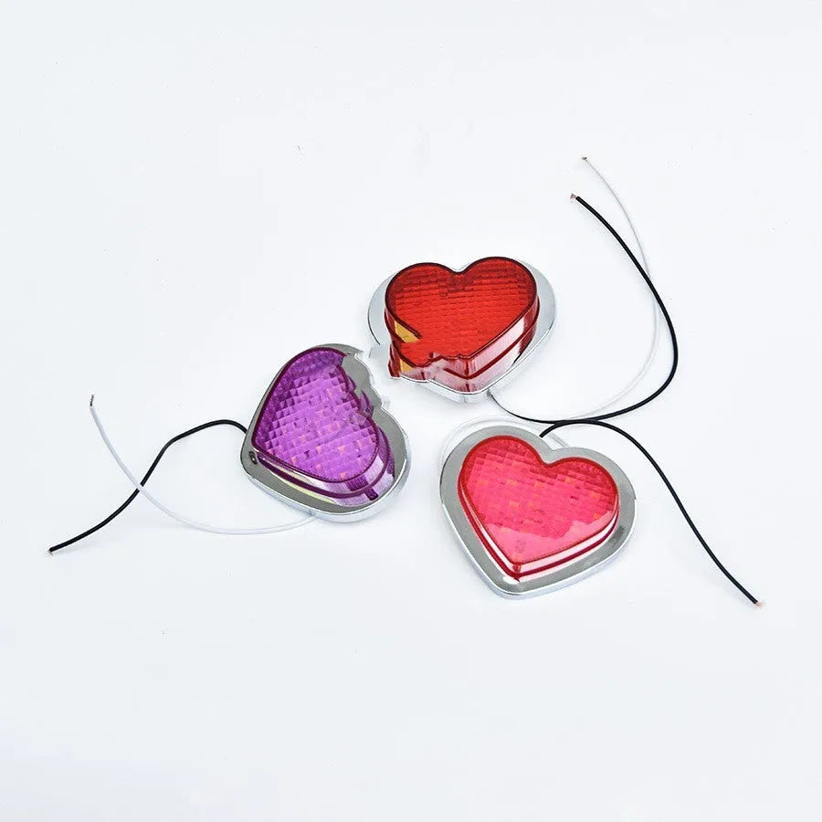 Heart-shaped LED vehicle sidelight in red colour showing Japanese-style design