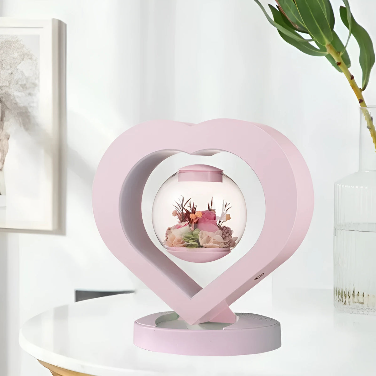 Pink preserved rose ornament with optional Bluetooth audio base and multiple plug options