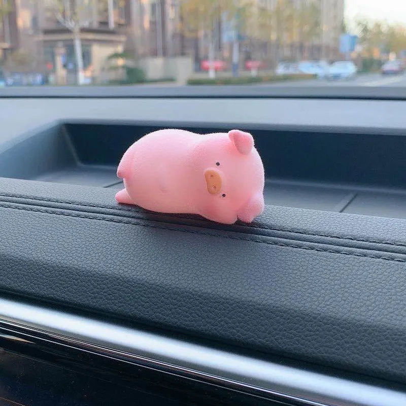 Cute 3D cartoon pig resin figurine for car dashboard decoration, shown in one of eight available styles.