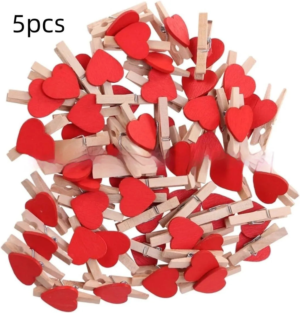 Set of five handmade solid wood heart-shaped hair clips in red, white, pink, yellow and rose.