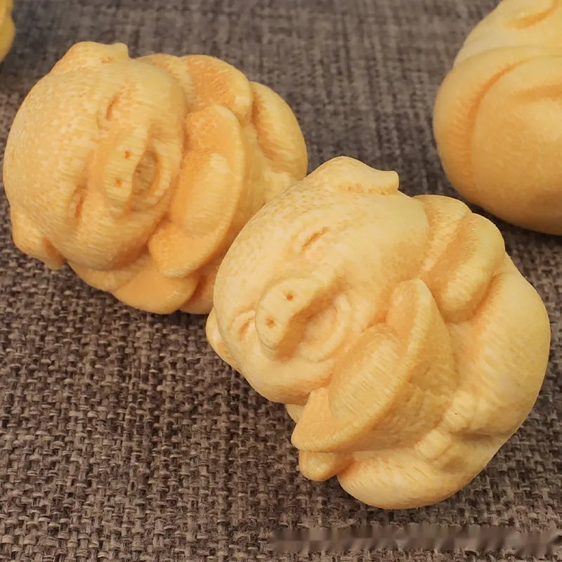 Solid bamboo Fulu pig carving ornament measuring 4cm tall with 3.5cm diameter in cute style