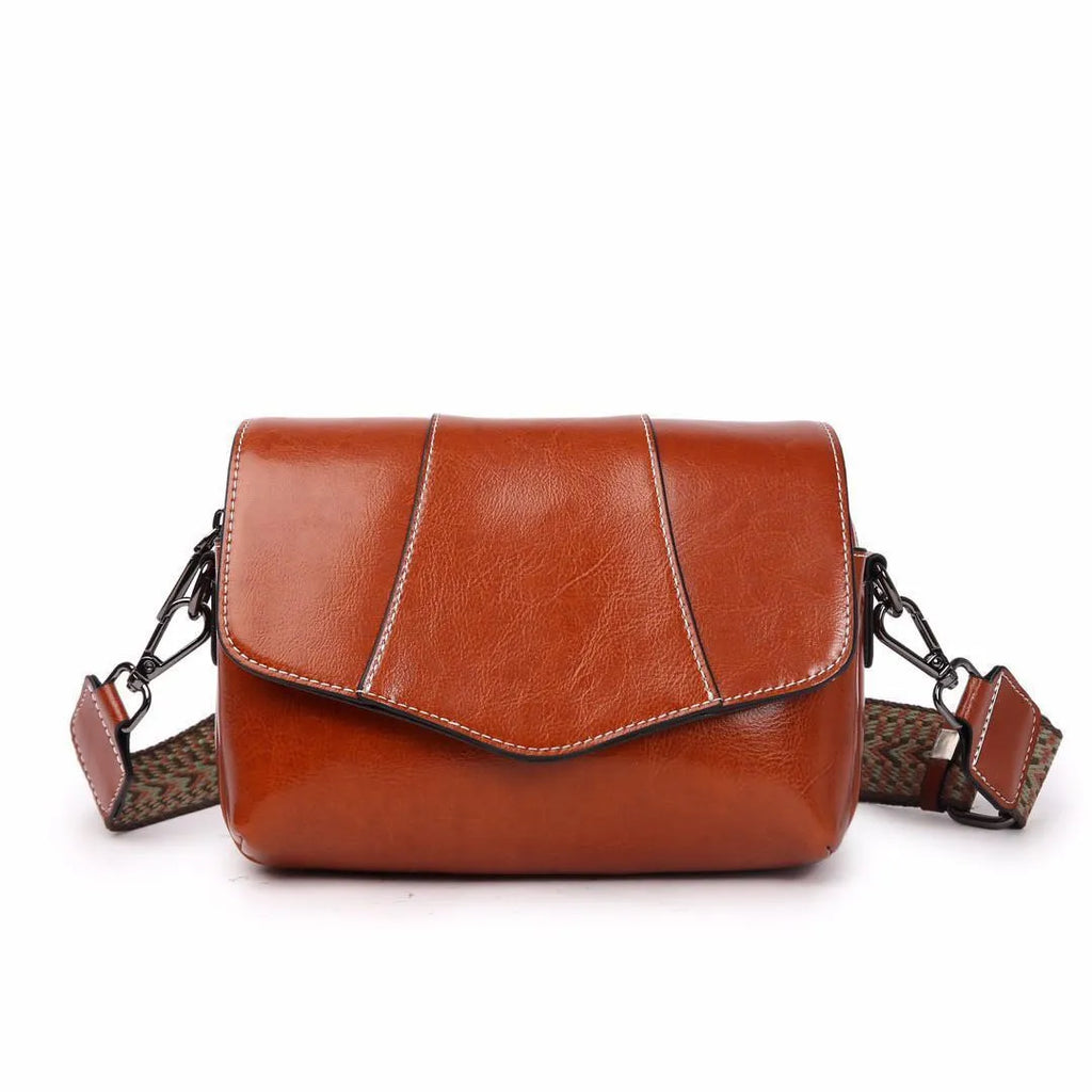 Leather women's casual zip crossbody bag in top grain leather, horizontal square shape, colour caramel