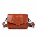Leather women's casual zip crossbody bag in top grain leather, horizontal square shape, colour caramel
