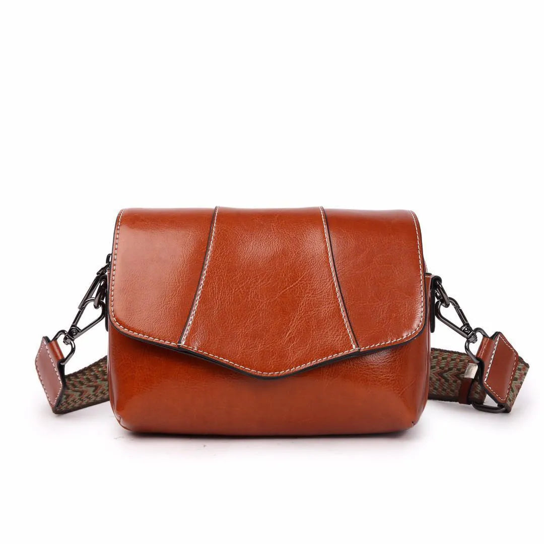 Leather women's casual zip crossbody bag in top grain leather, horizontal square shape, colour caramel
