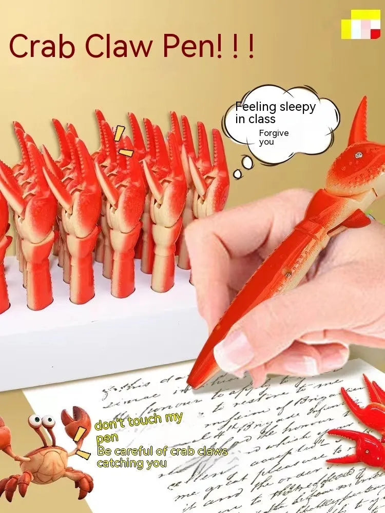 Close-up of a ballpoint pen with a red crab-shaped clip featuring a pressable can mechanism.