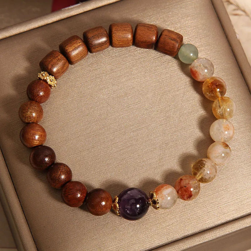Women's bracelet with pineapple yellow tower crystal, ebony amethyst tones, pearl and rhinestone decorative elements