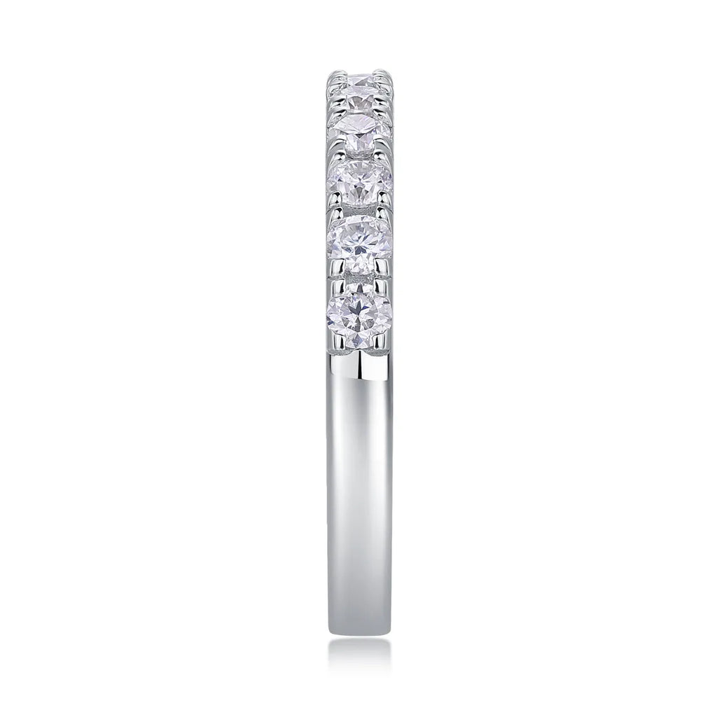 Parallel World moissanite wedding ring set in gold and rose gold on a gift box