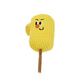 Corn cob shaped cat toy made from natural polio wood on a white background.