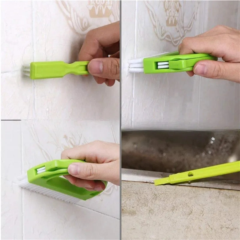 Three green plastic floor seam cleaning brushes arranged on a hard floor surface