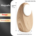 Creative Magsafe magnetic phone holder wireless charger in walnut resin colour on desk, 15.5cm length