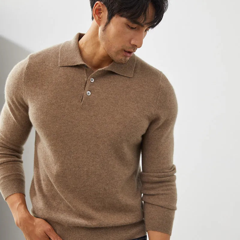 Man wearing a sapphire blue cashmere polo collar pullover sweater in a loose fit.