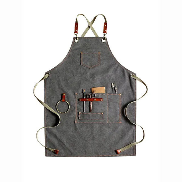 Canvas apron with cross back straps in camel colour for café or baking work