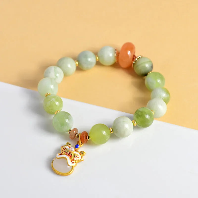 Green milk-in-water Xingshi pendant on handmade jade bracelet with 10mm geometric beads