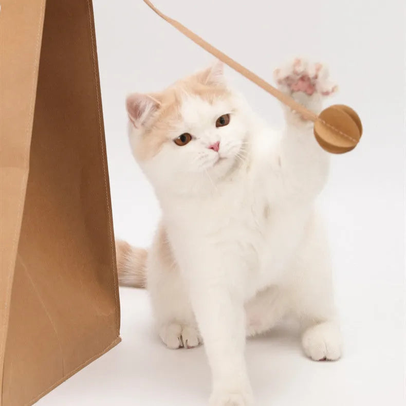 Brown kraft paper cat nest with integrated corrugated paper scratch board, measuring 40x30x53cm