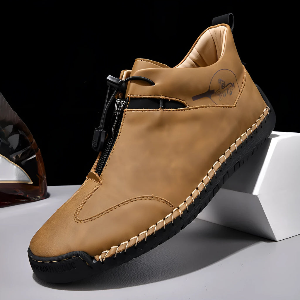 Men's black casual leather shoes with round toe, tall crown, and rubber sole.
