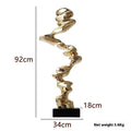Modern minimalist abstract still life decorative ornament in gold, silver, or blue resin finish.