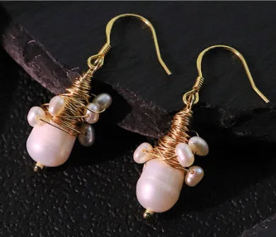 Handmade natural pearl embellished wire-wrapped earrings in geometric round shape for women