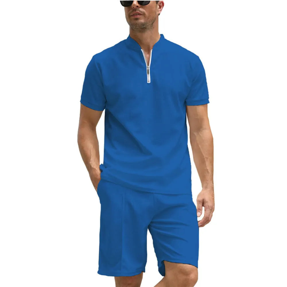 Men's solid colour polo shirt and trouser two-piece set in beaded bird's eye polyester fabric.