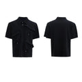 Men's black loose-fit polo shirt with a deconstructed multi-collar and geometric chest pattern.