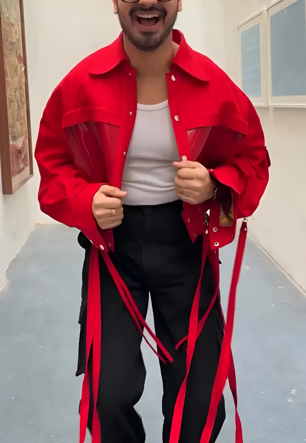 Men's red short jacket with full zip front, stand collar, and two side zip pockets