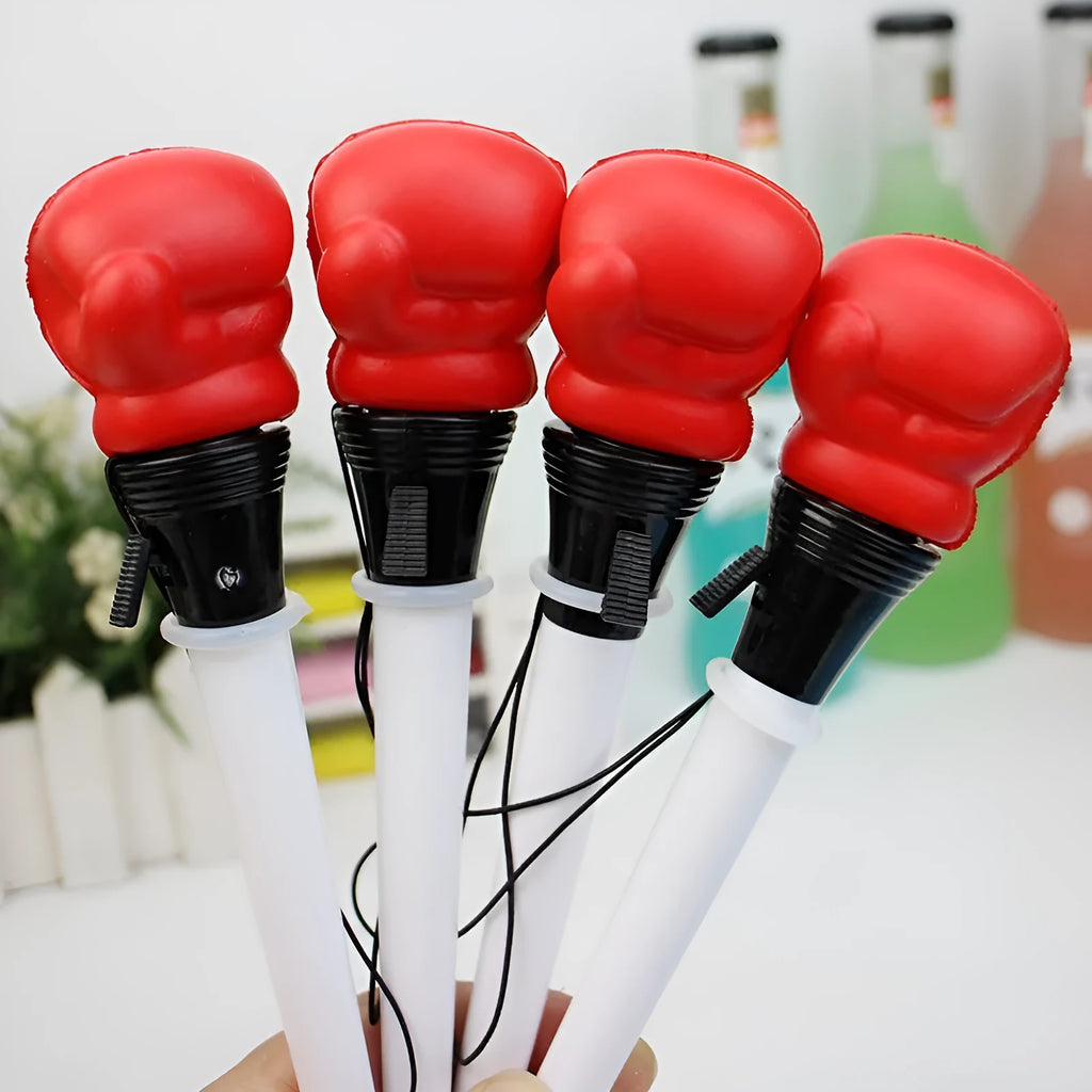 Four pressure relief boxing press ejection pens with 0.7mm bullet tips and black ink refills