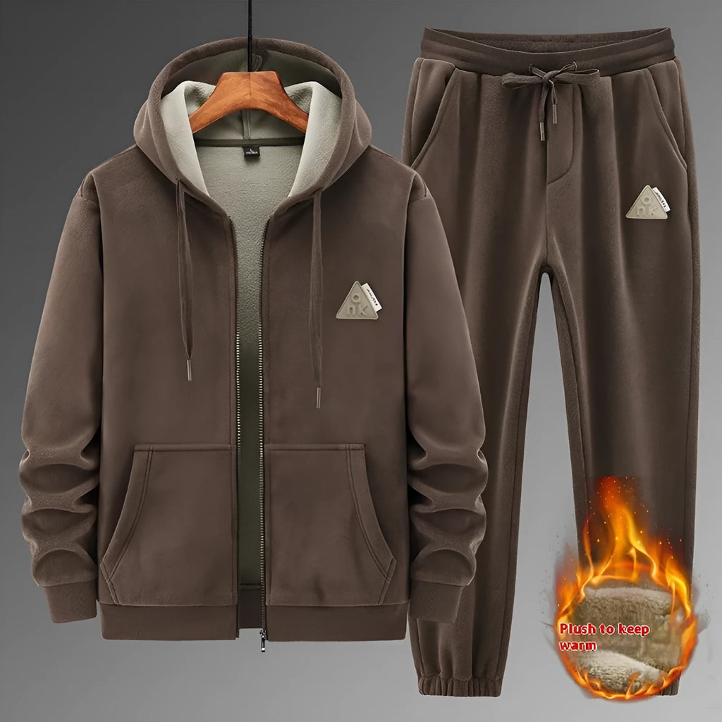 Grey casual sports suit set featuring a hooded long-sleeve sweater and matching trousers on a hanger.