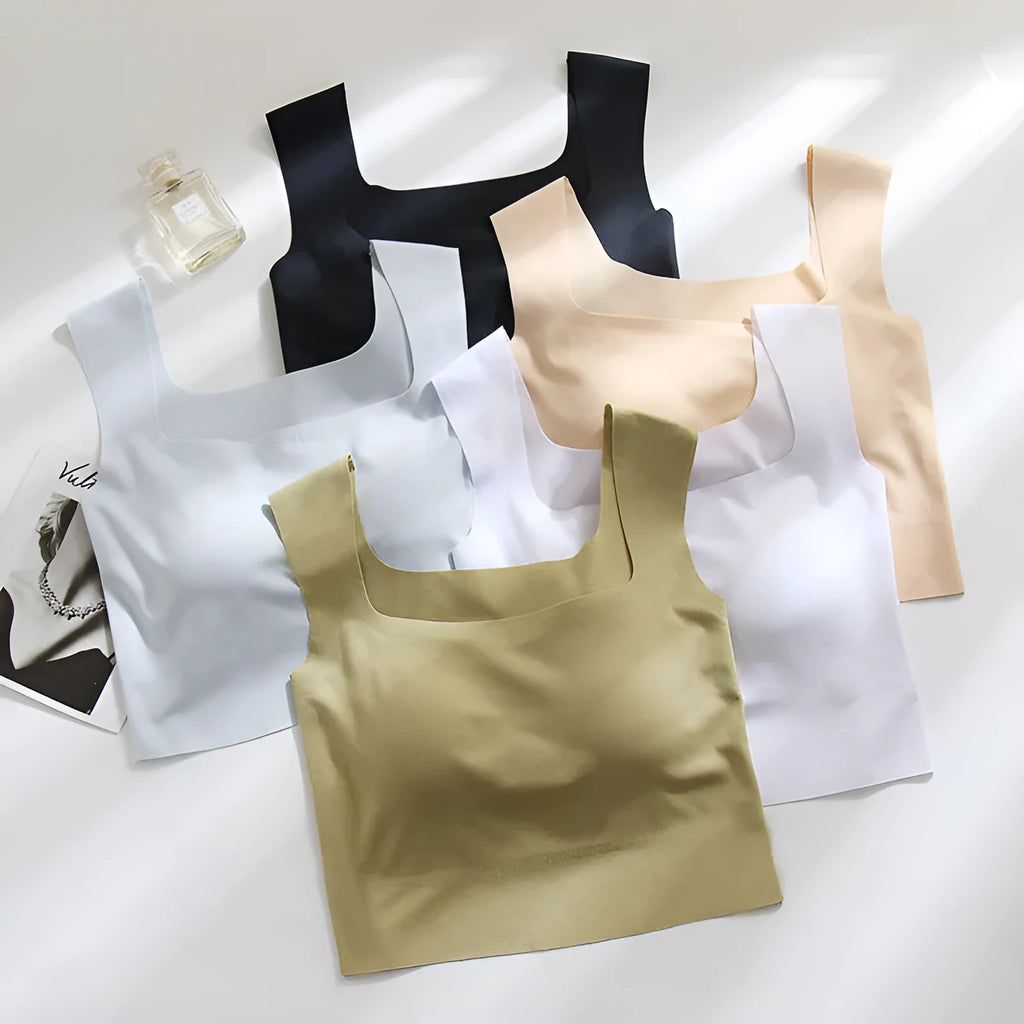 Women's non-marking seamless nylon sling vest with chest pad in light blue, shown from the back.