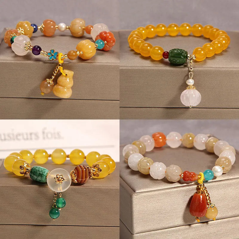 Yellow agate crystal bracelet with gold silk thread and adjustable sliding knot closure