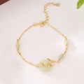 Women's antique style 925 silver bracelet with Hetian jade and peace buckle safety clasp in gold finish