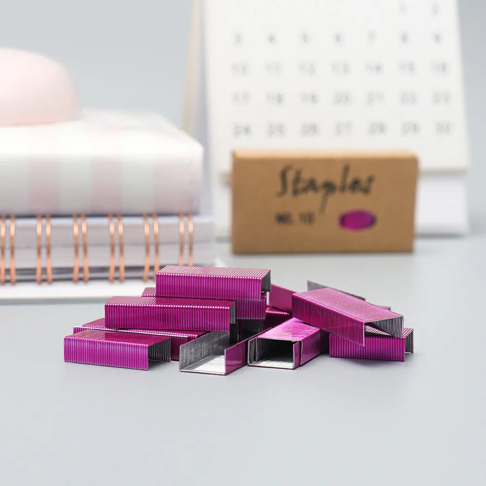 Box of 1000 metal stitching needle staples in four colour options: black, purple, rose gold and rose red