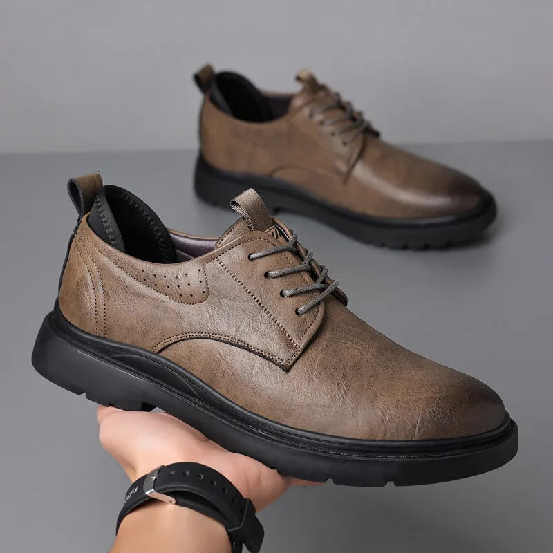 Men's black leather business shoes with rubber soles and sewing line detail