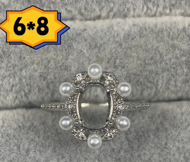 Oval denier ring with 6*8 stone, open mouth setting and star detail in Korean style