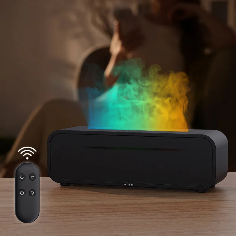 Black and white essential oil diffuser with flame effect and colour-changing lights next to remote control