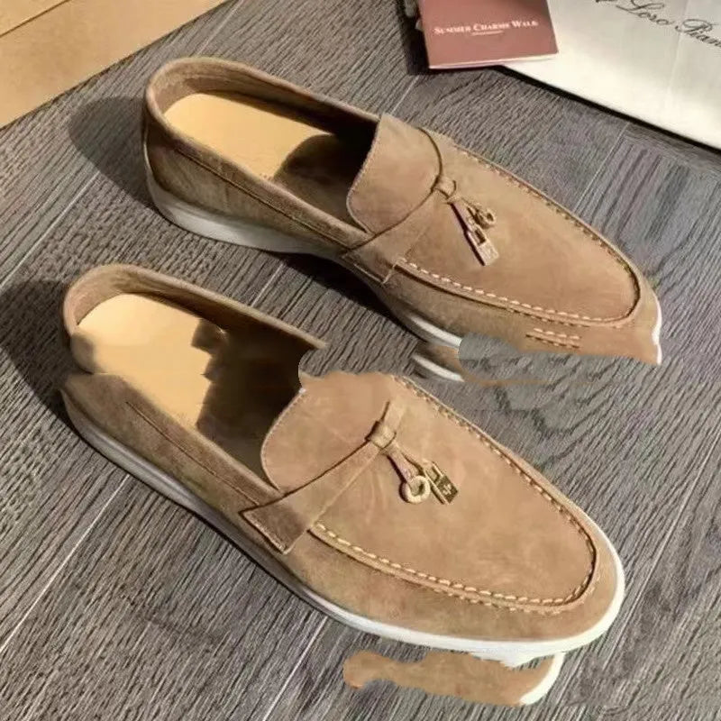 Unisex slip-on loafers with round toe design and decorative stitching in multiple colour options