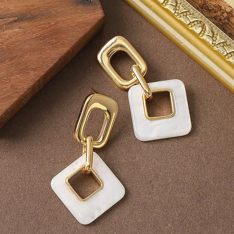 Copper geometric square earrings with hollow design and chamfered corners