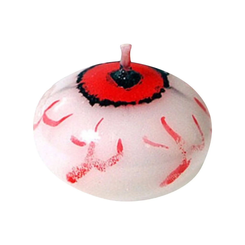 Red oval eyeball floating Halloween candle made from paraffin wax