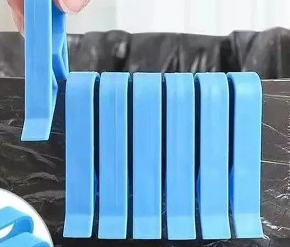 A white PP plastic garbage bag fixing clip designed to secure bin liners to rubbish cans.