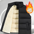 Men's striped lambswool vest in black, shown on a hanger for autumn and winter wear.