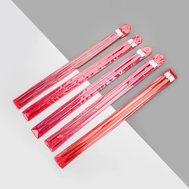 Crochet hook set showing 14 different sizes from 2.0mm to 10.0mm with protective caps and duplicate hooks