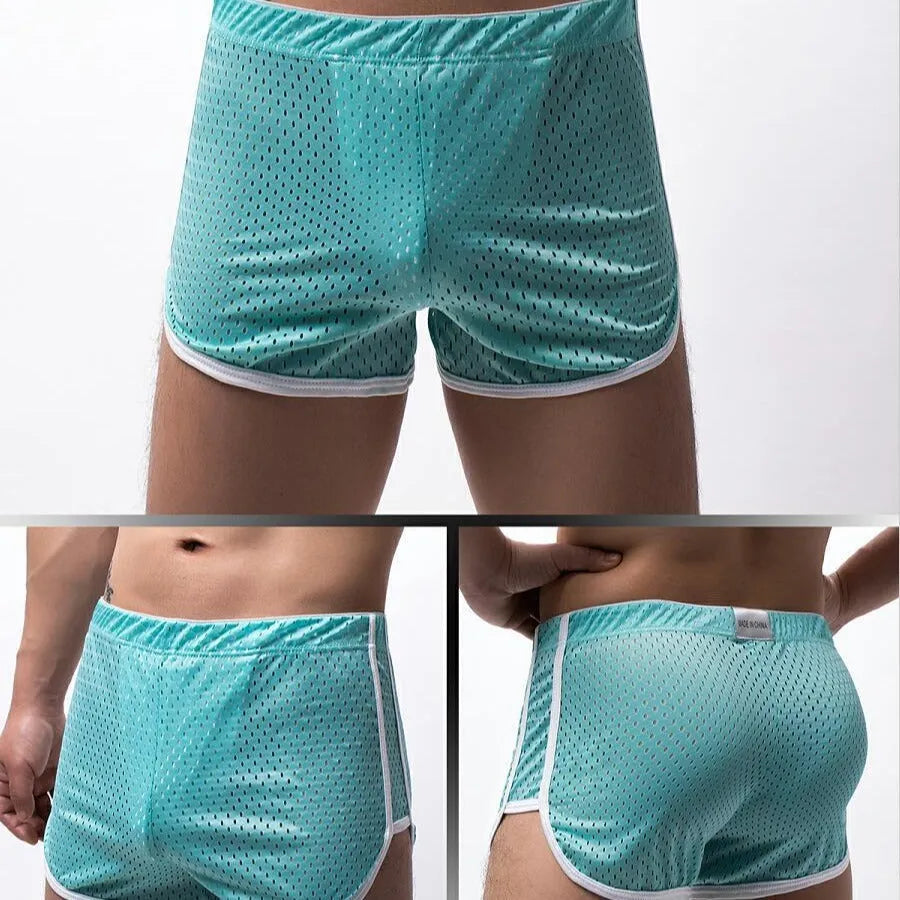 Men's black three-point boxer briefs made from cotton and nylon fabric.
