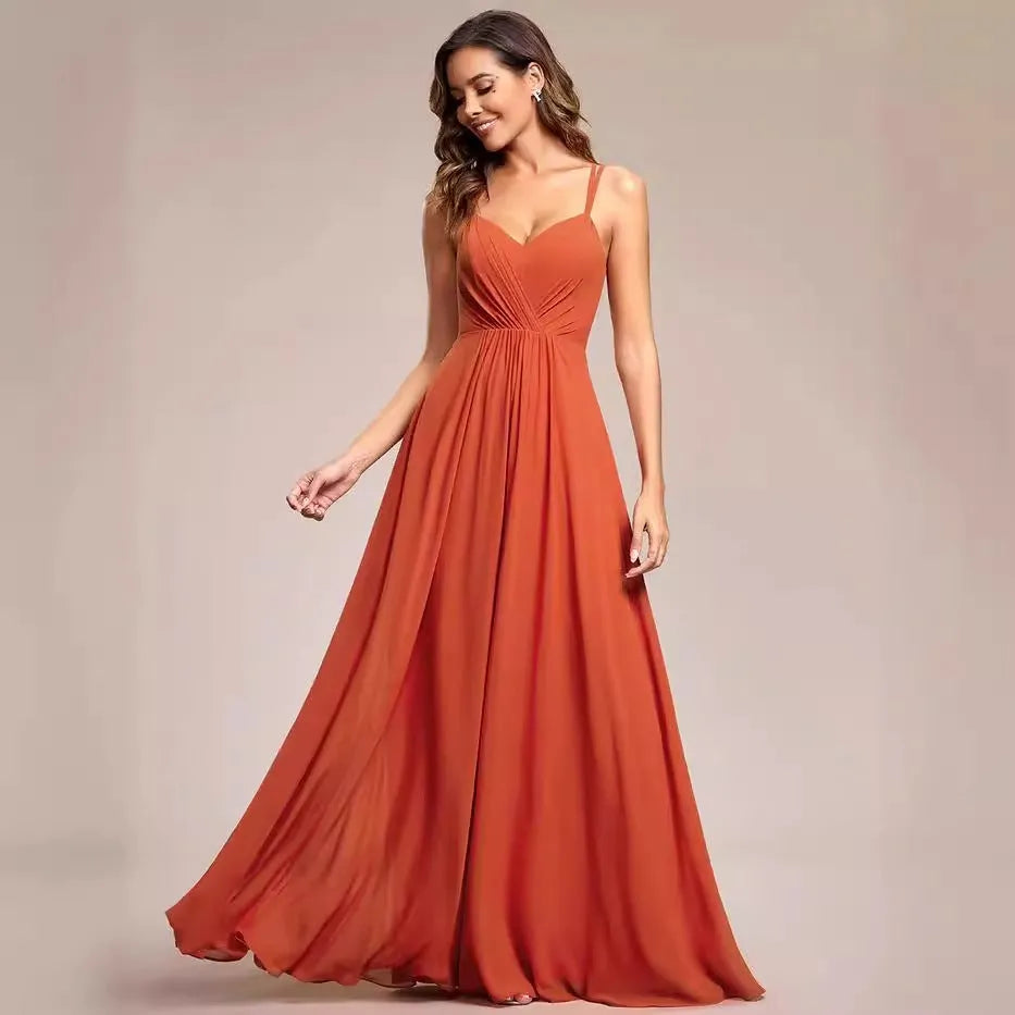 Women's sleeveless long A-line dress in polyester with pleated detailing, shown in light green colour