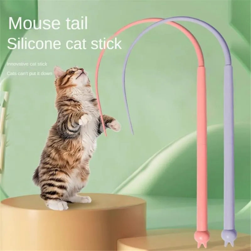 Blue interactive cat teaser stick with silicone mouse tail and cat head handle on a wooden floor.
