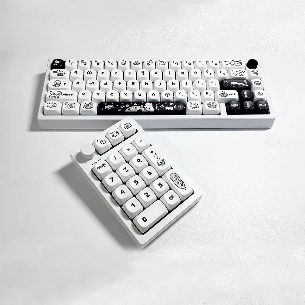 Black and white MOA height key cap set with kitten fantasy design on a mechanical keyboard