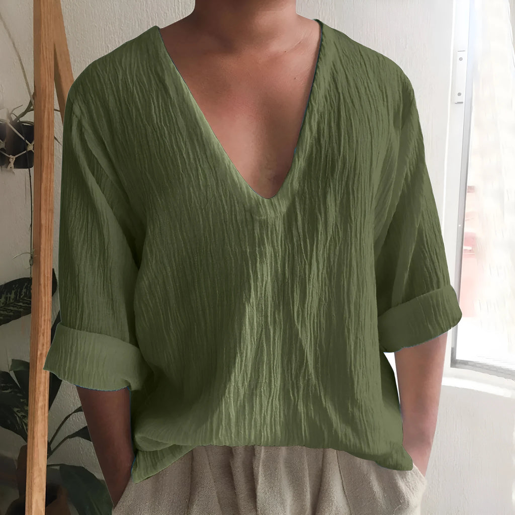 Men's solid colour V-neck long sleeve t-shirt in washed cotton fabric on a hanger.