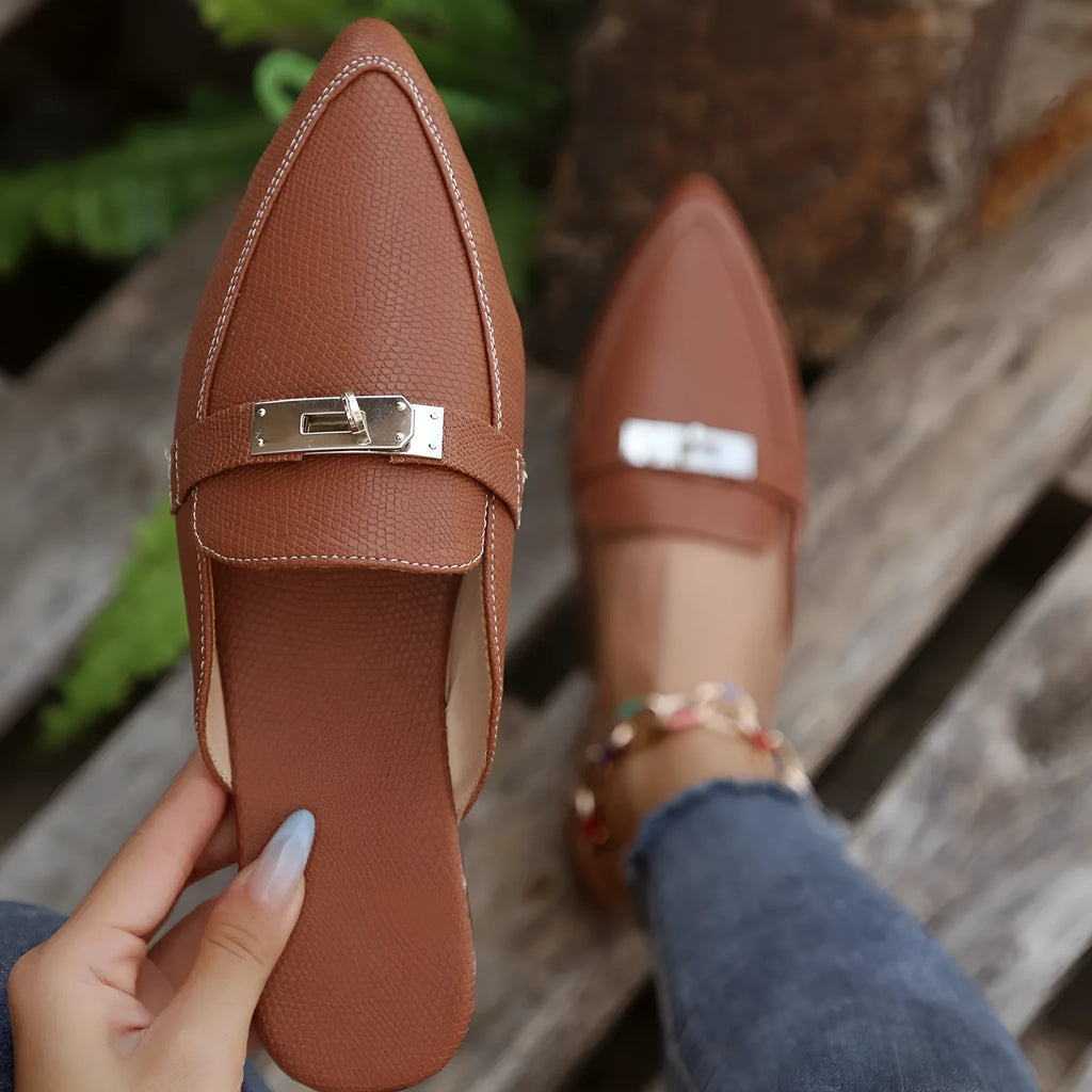 Light brown women's pointed-toe low heel semi-slippers with a rubber sole.