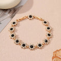 Electroplated zinc alloy flower bracelet with coloured gems in gold and silver colour options