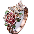 Adjustable butterfly personality ring with oil-drip colour effect showing flower and insect details